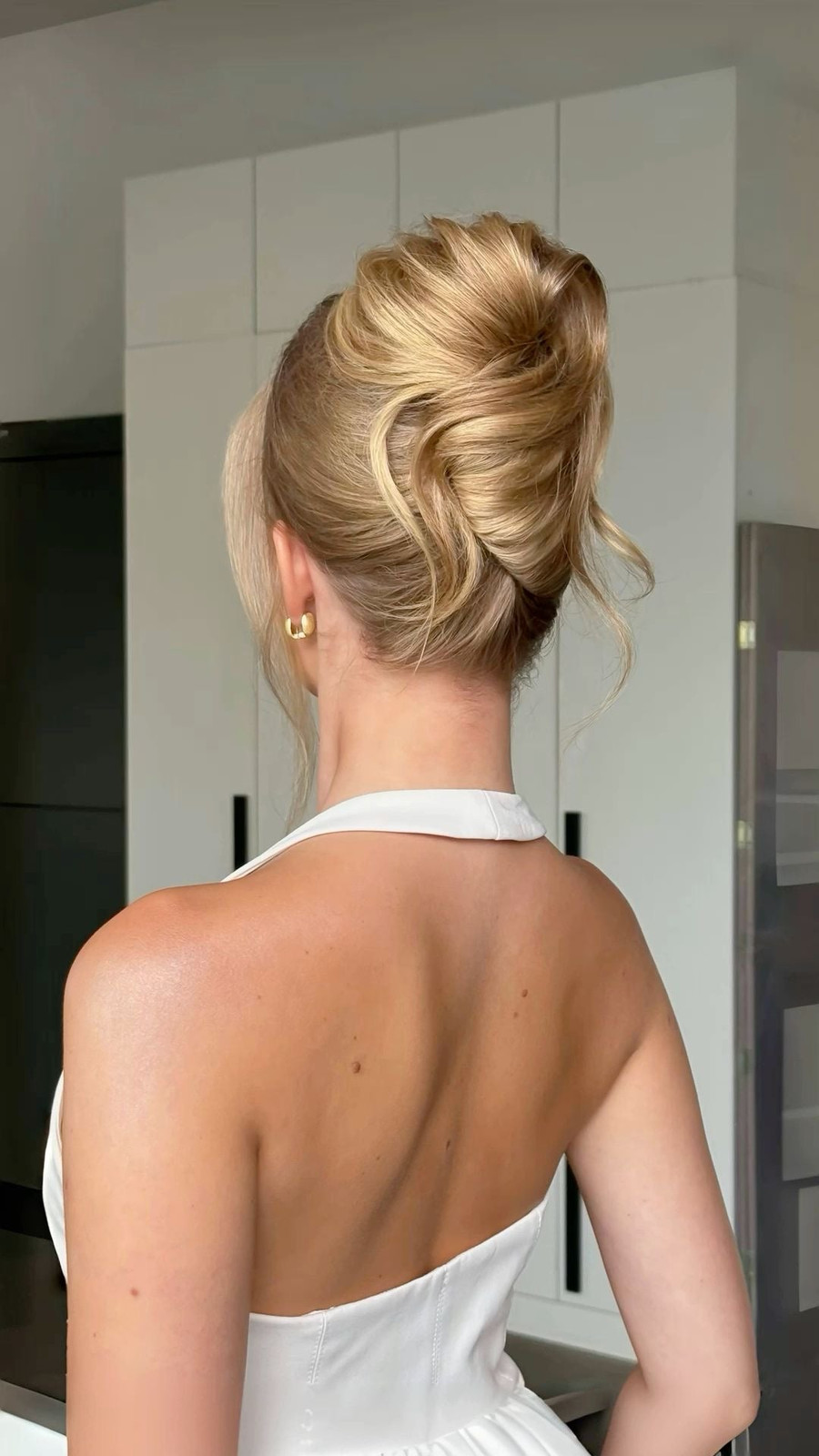 Blonde Sculpted High Bun — Bridesmaid Hairstyles 2027