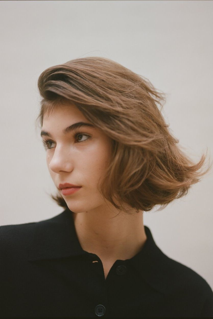 Chin Bob With Volume and Flicked Ends Chin Bob With Volume and Flicked Ends — Brown Bob 2027