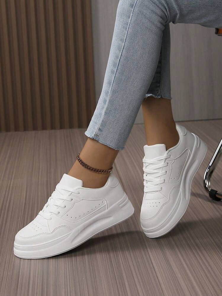 Ripped Skinny Jeans and Platform Sneakers with Anklet Ripped Skinny Jeans and Platform Sneakers with Anklet — White Sneakers Outfits 2027