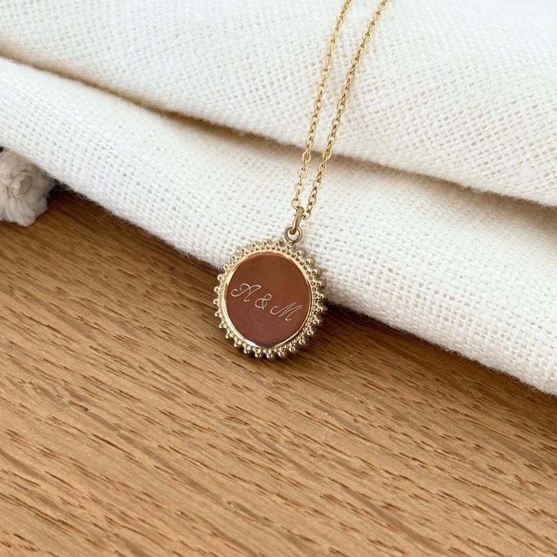 White Top Accented by an Engraved Beaded Medallion Pendant White Top Accented by an Engraved Beaded Medallion Pendant — Locket Necklaces 2027