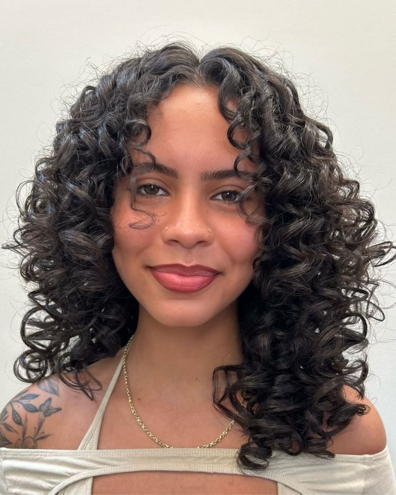 Short Curly Shag With Textured Bangs Short Curly Shag With Textured Bangs — 3B Curly Hairstyles 2027