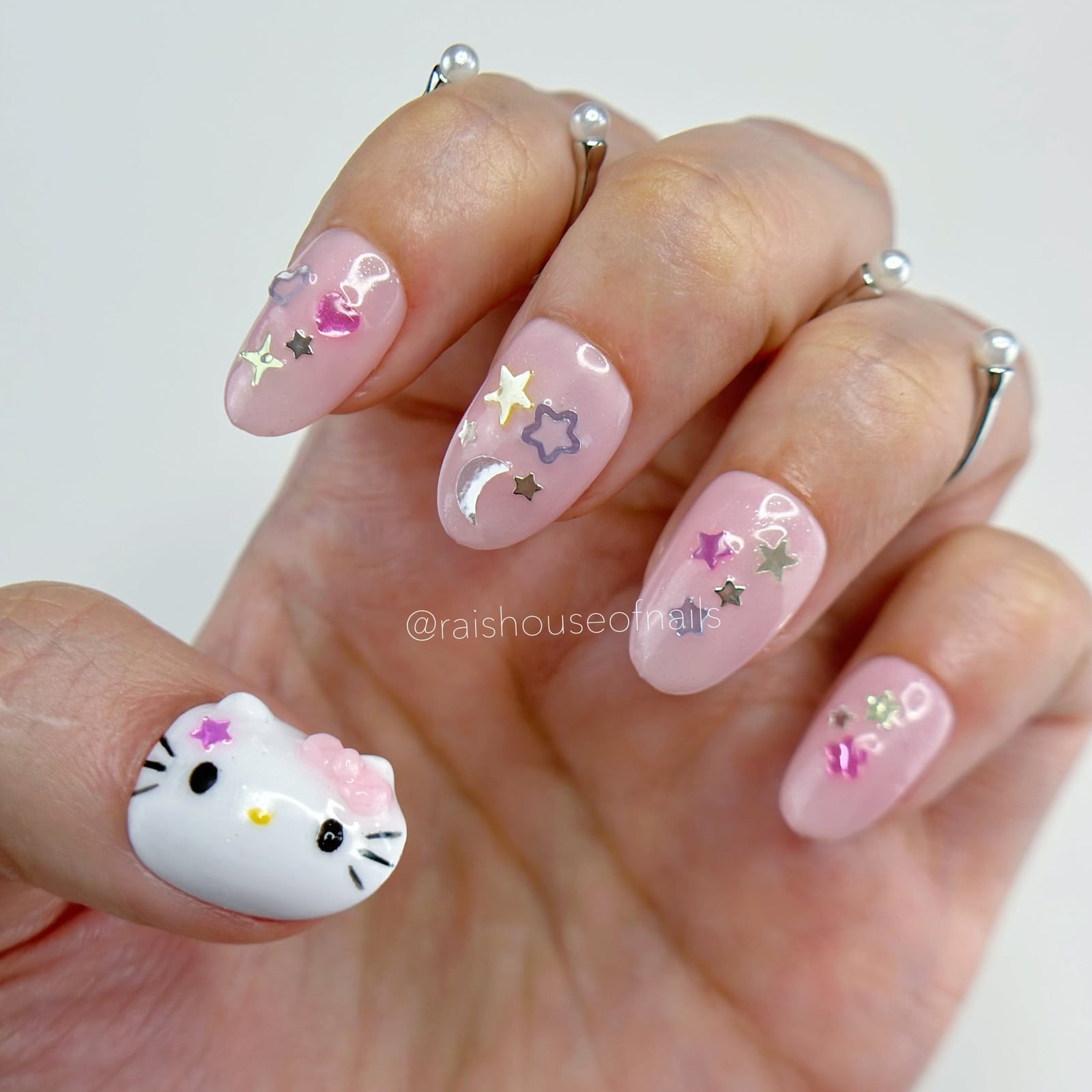 Sheer Pink Medium Almond with 3D Hello Kitty Face Sheer Pink Medium Almond with 3D Hello Kitty Face — 3D Hello Kitty Nails 2027