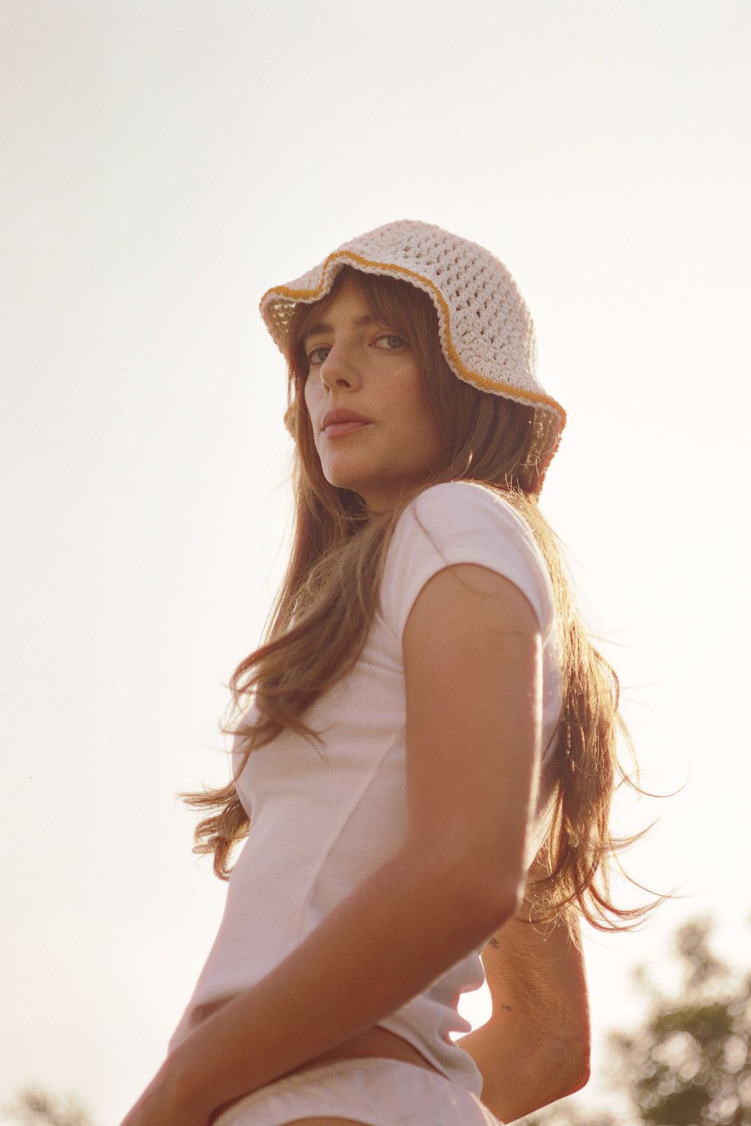 Minimalist White T-shirt with Crochet Bucket Hat — Vanilla Girl Outfits 2027