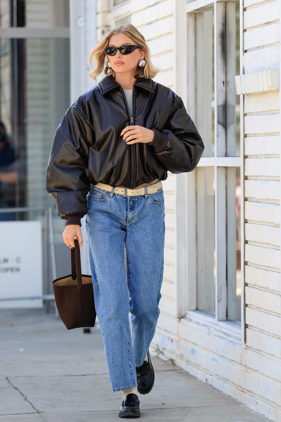 Blue Straight Leg Jeans Paired with a Black Leather Bomber Jacket and Loafers Blue Straight Leg Jeans Paired with a Black Leather Bomber Jacket and Loafers — Straight Leg Jeans 2027