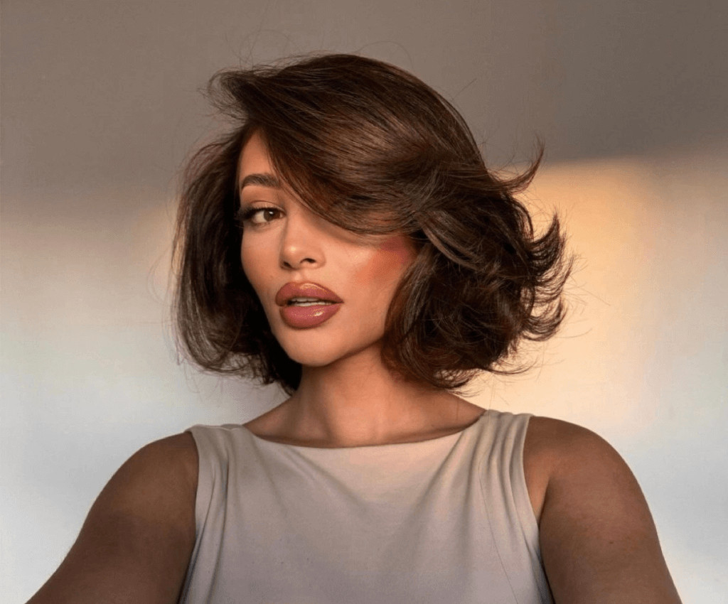 Dark Brown Bob With Voluminous Blowout Dark Brown Bob With Voluminous Blowout — Layered Bob 2027