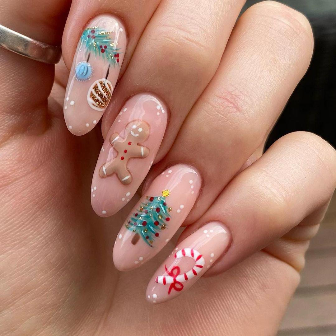 Nude Pink Oval Christmas Motif Nails Nude Pink Oval Christmas Motif Nails — Christmas Almond Nails 2026