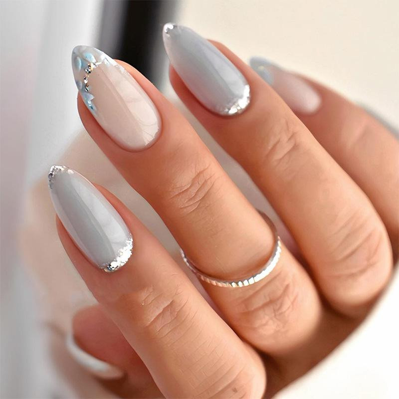 Light Grey with Silver Glitter French — Medium Almond Nails 2027