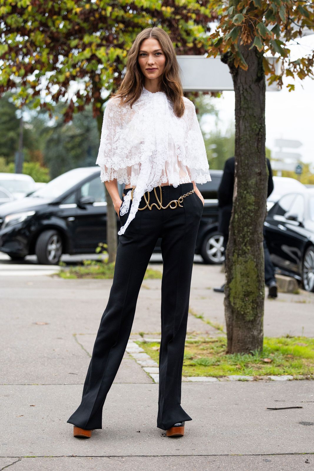 White Lace Mesh Top With Oversized Bow and Wide-Leg Trousers — Mesh Top Outfits 2027