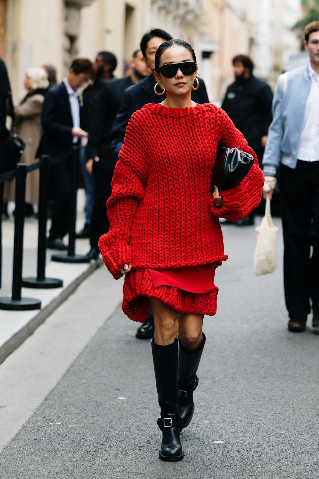 Textured Layers: Red Knit Sweater Over a Mini Dress Textured Layers: Red Knit Sweater Over a Mini Dress — Red Outfits 2027
