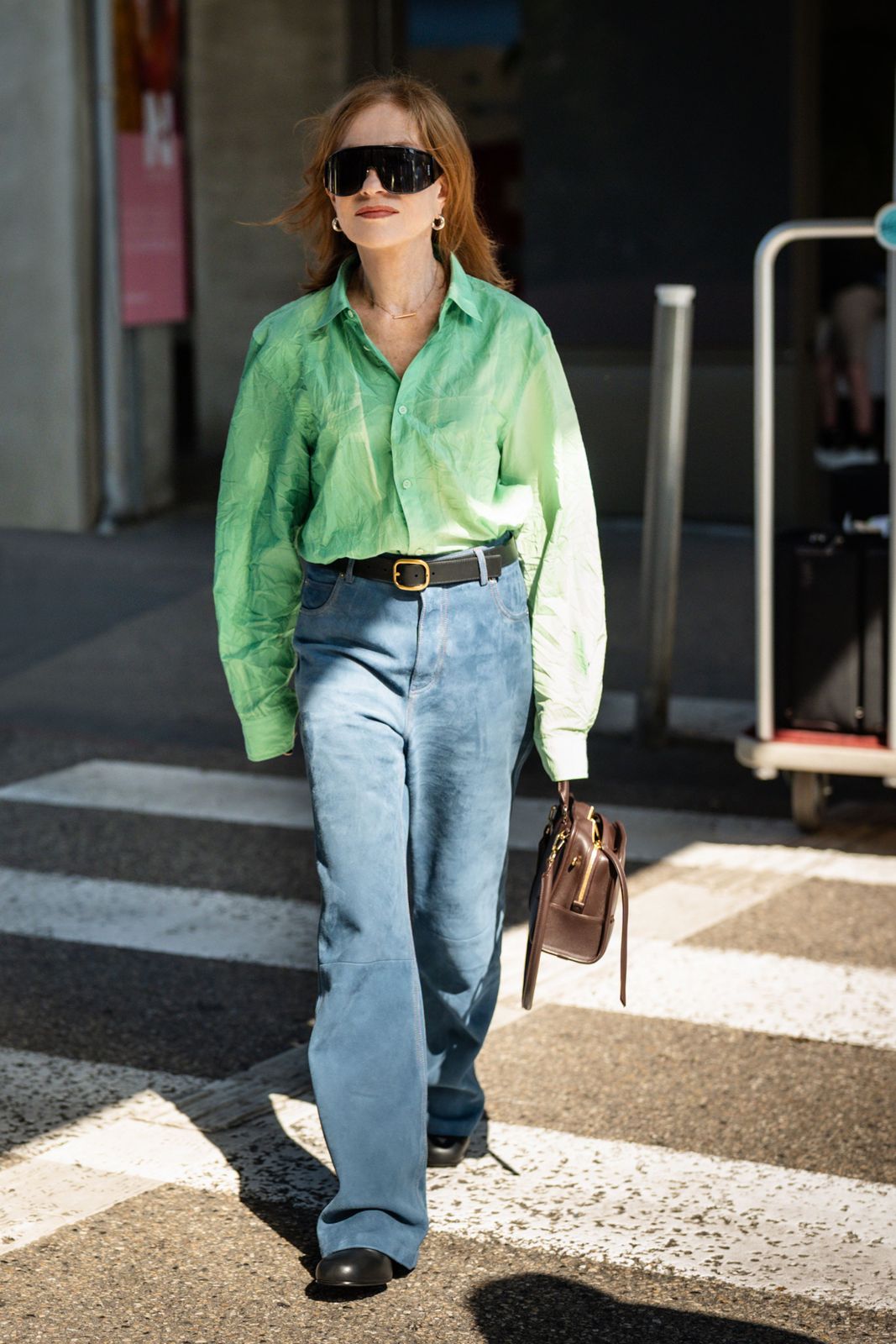 Oversized Green Crinkled Shirt with Denim Trousers for Effortless Chic Oversized Green Crinkled Shirt with Denim Trousers for Effortless Chic — Italy Outfits 2027