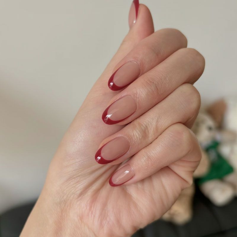 Sheer Nude with Burgundy French Tips Sheer Nude with Burgundy French Tips — Burgundy Christmas Nails 2026