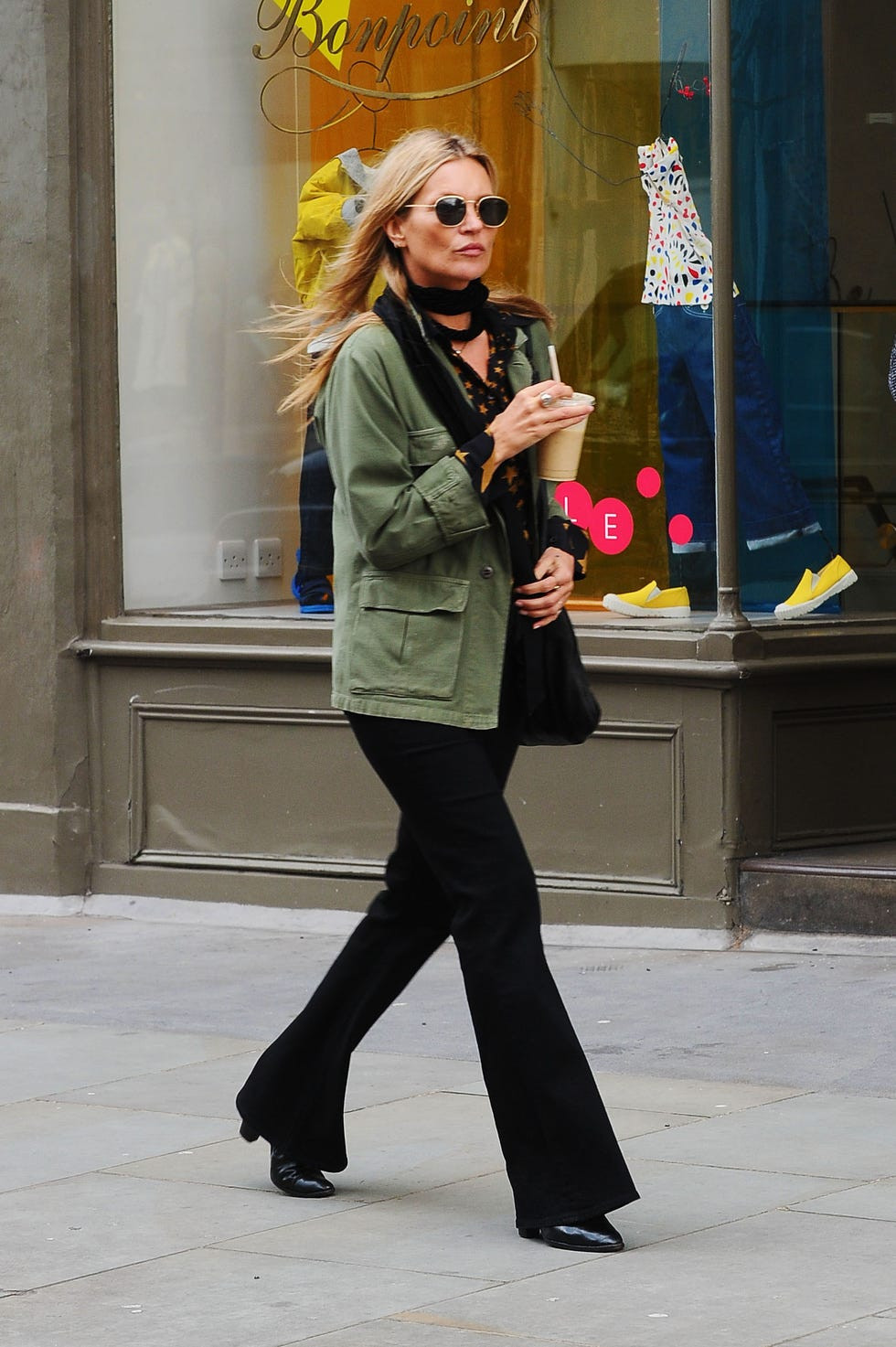 Casual Chic: Black Flare Leggings with a Printed Blouse and Utility Jacket Casual Chic: Black Flare Leggings with a Printed Blouse and Utility Jacket — Flare Leggings Outfits 2027