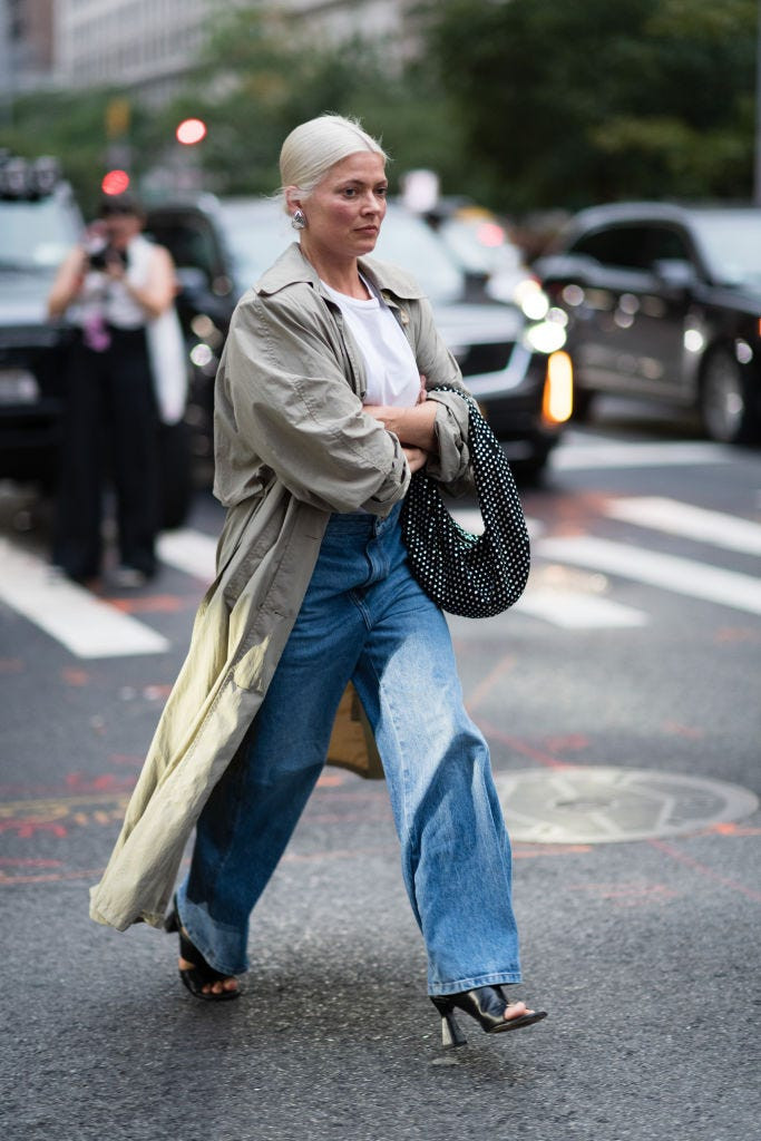 Long Trench Coat and Sparkly Bag with Light Wide-Leg Jeans — Wide Leg Jeans Outfits 2027