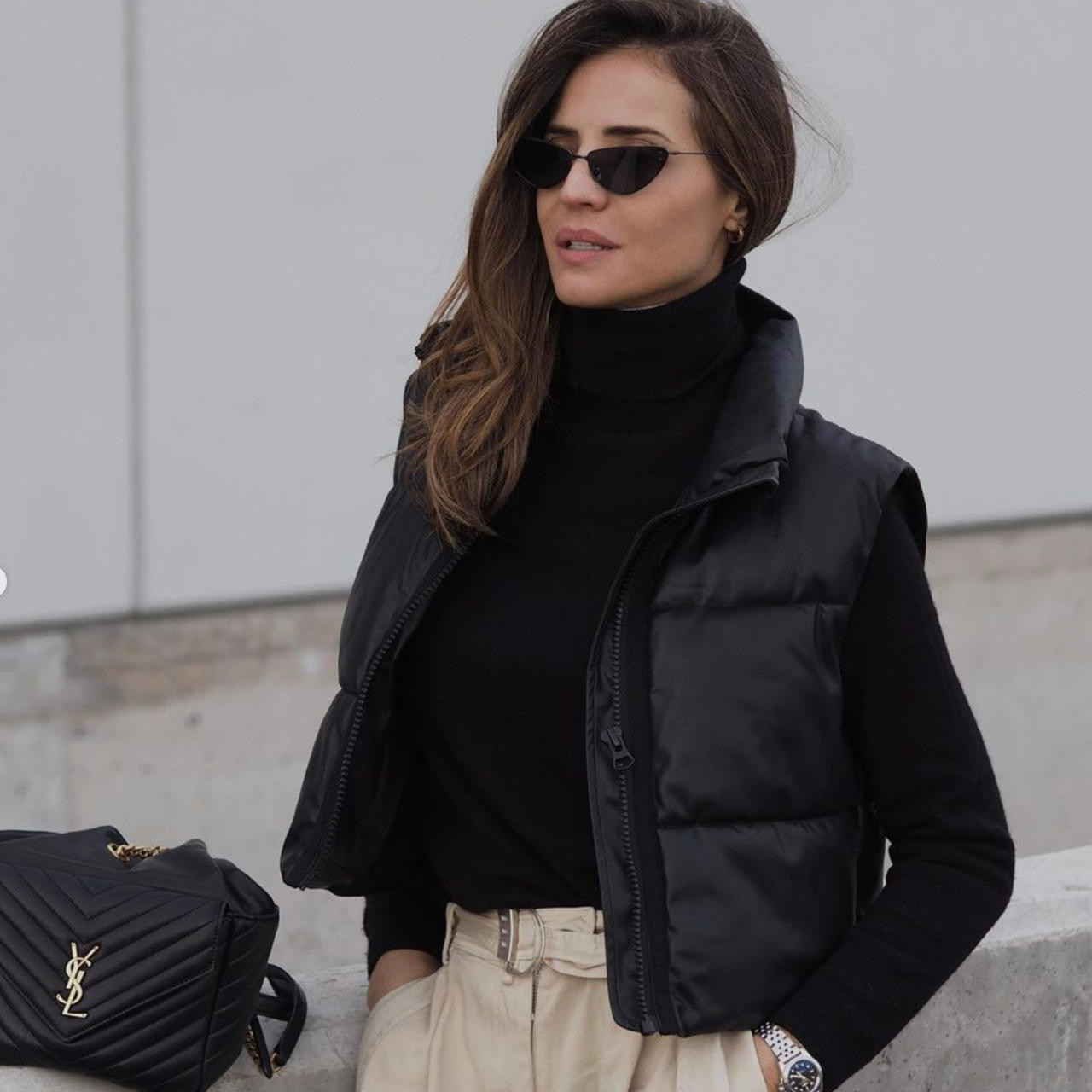 Streamlined Style: Black Vest with Turtleneck and Beige Trousers Streamlined Style: Black Vest with Turtleneck and Beige Trousers — Puffer Vest Outfits 2027
