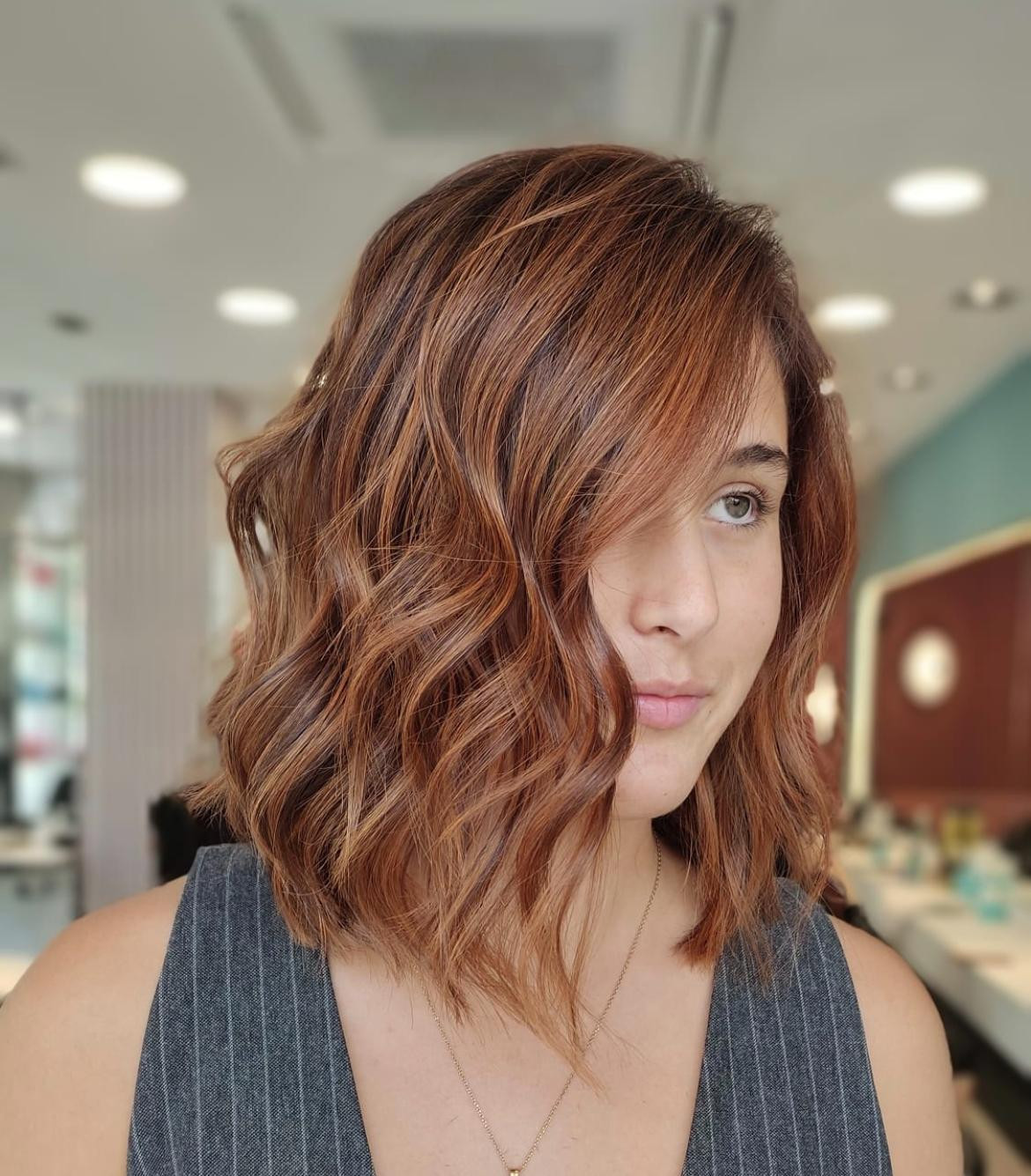 Copper Chin Length Bob With Side Swept Bangs Copper Chin Length Bob With Side Swept Bangs — Professional Hairstyles 2027
