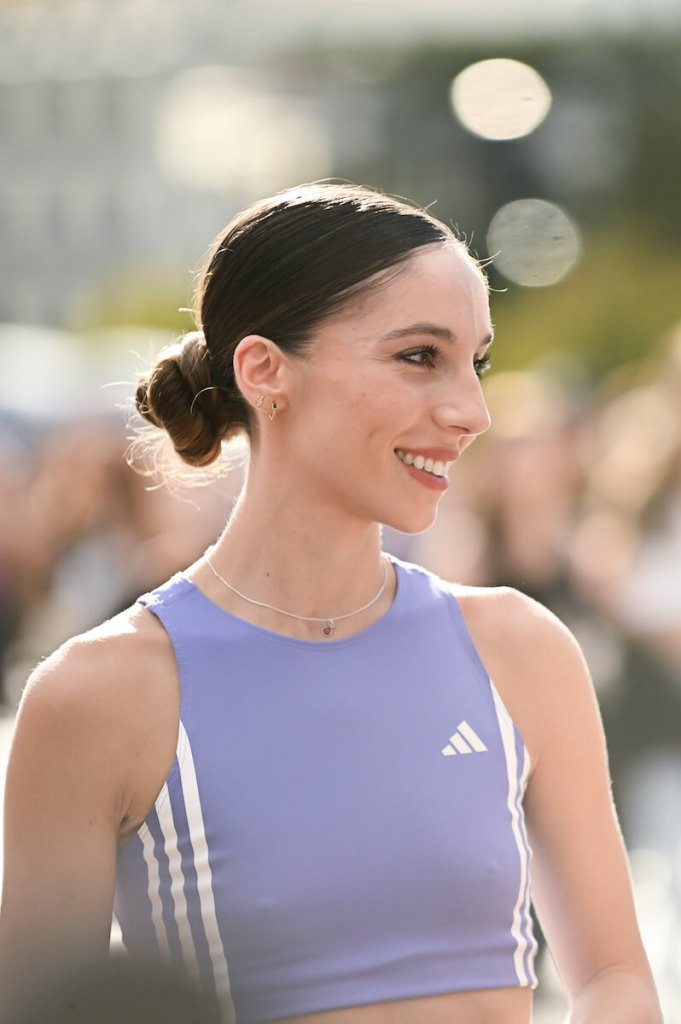 Neat Dark Brown Low Bun — Hiking Hairstyles 2027