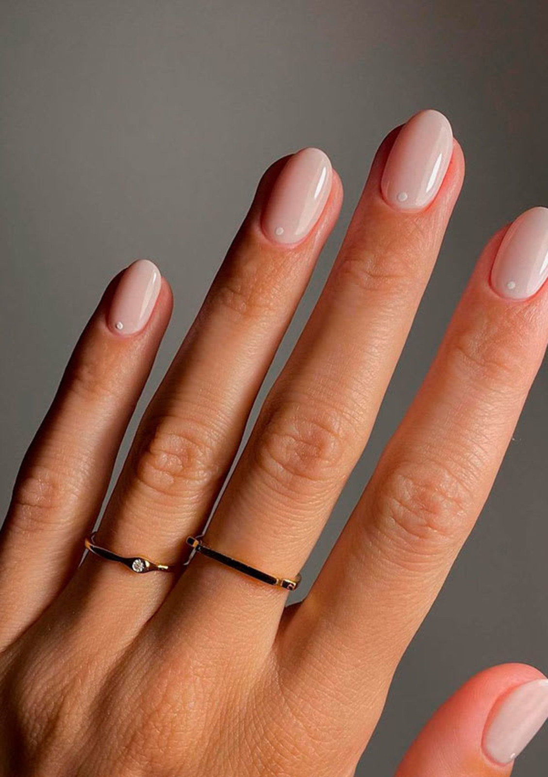 Pale Pink with Minimalist White Dot — Medium Almond Nails 2027