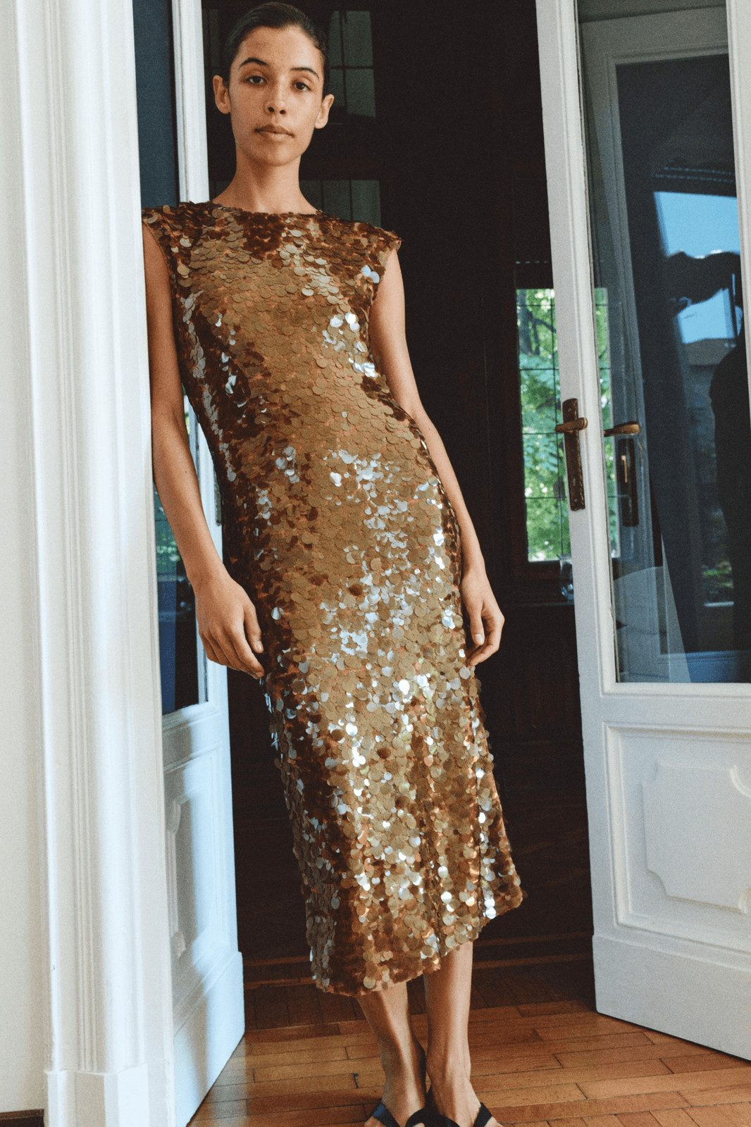 Gold Sequin Midi Dress with Black Flat Sandals — Cocktail Party Outfits 2027
