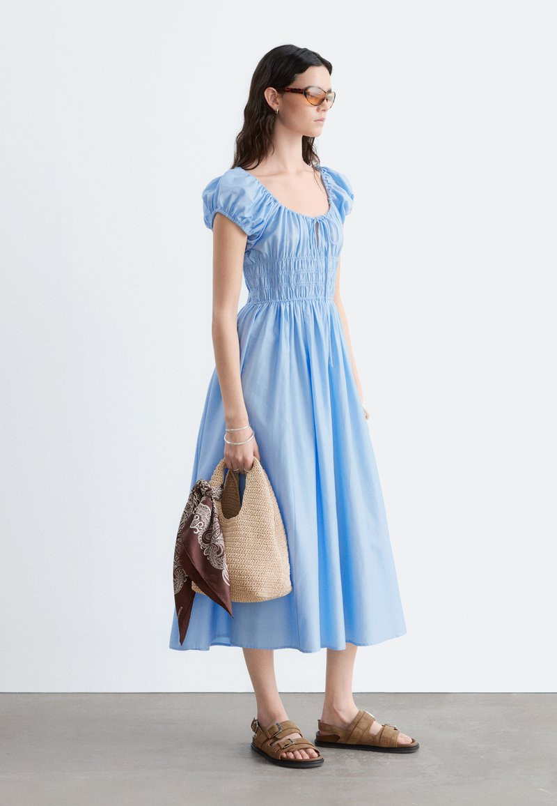 Baby Blue Puff Sleeve Midi Dress with Smocked Bodice for Daytime Casual Baby Blue Puff Sleeve Midi Dress with Smocked Bodice for Daytime Casual — Baby Blue Outfits 2027