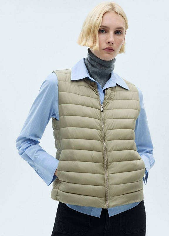 Effortless Layers: Beige Vest Over Collared Shirt and Turtleneck Effortless Layers: Beige Vest Over Collared Shirt and Turtleneck — Puffer Vest Outfits 2027