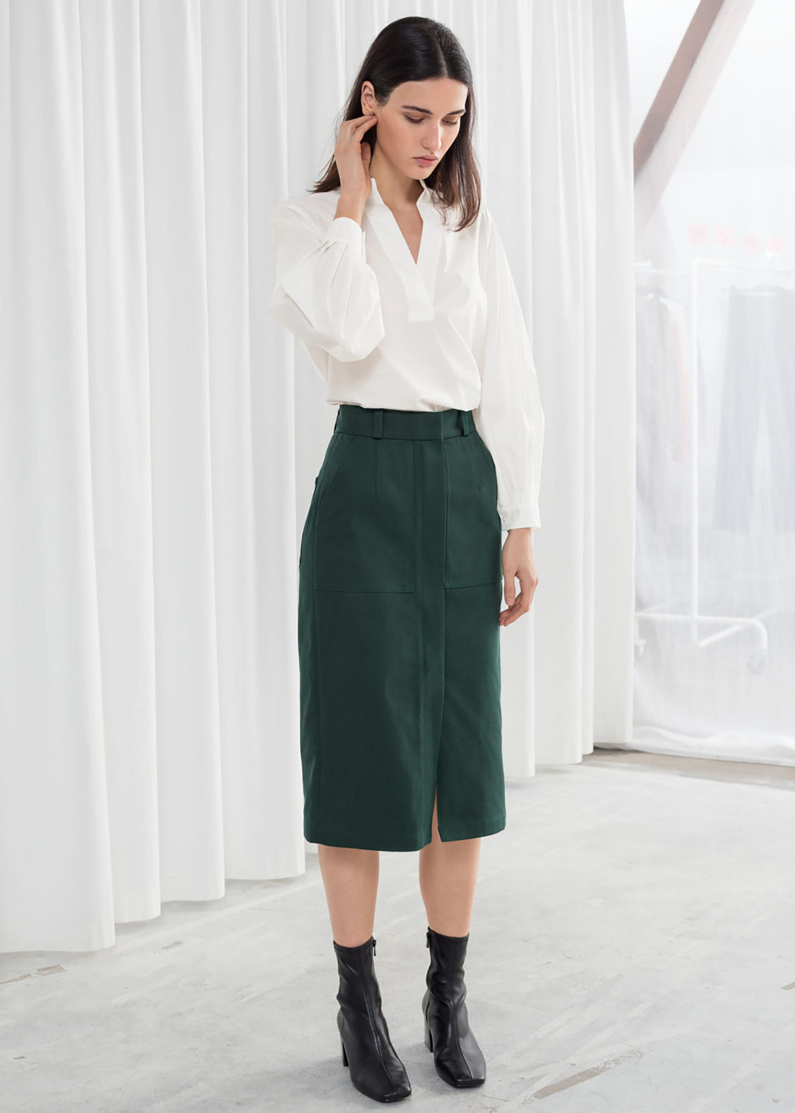 White V-Neck Blouse with Dark Green Midi Skirt White V-Neck Blouse with Dark Green Midi Skirt — Presentation Outfits 2027