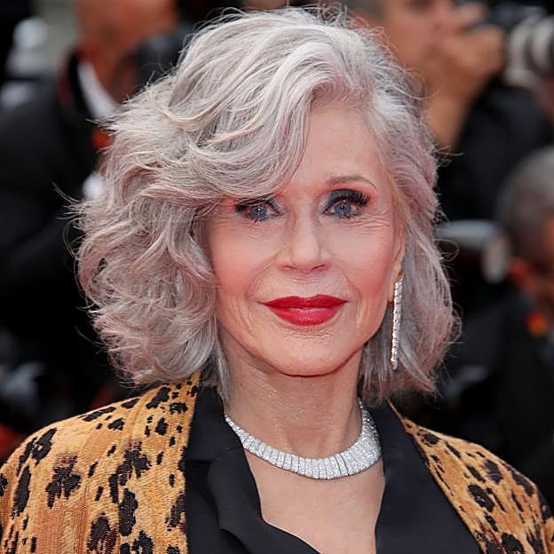 Voluminous Silver Curls With Side Part Voluminous Silver Curls With Side Part — Hairstyles 2027 for Women Over 60