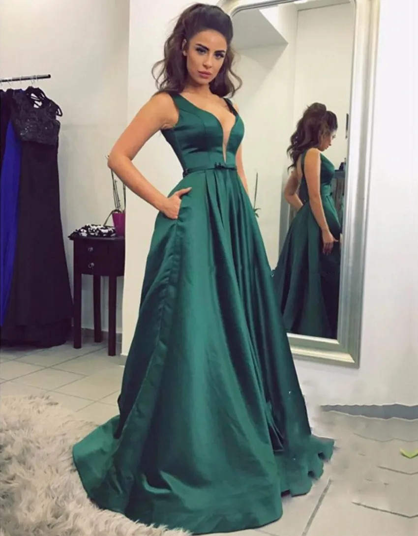 Dark Green Satin Ballgown with Pockets and Bow Detail Dark Green Satin Ballgown with Pockets and Bow Detail — Satin Prom Dresses 2027