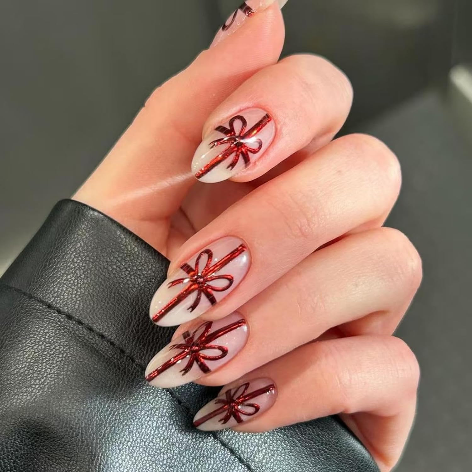 Red Glitter Bows on Medium Almonds Red Glitter Bows on Medium Almonds — Christmas Bow Nails 2026