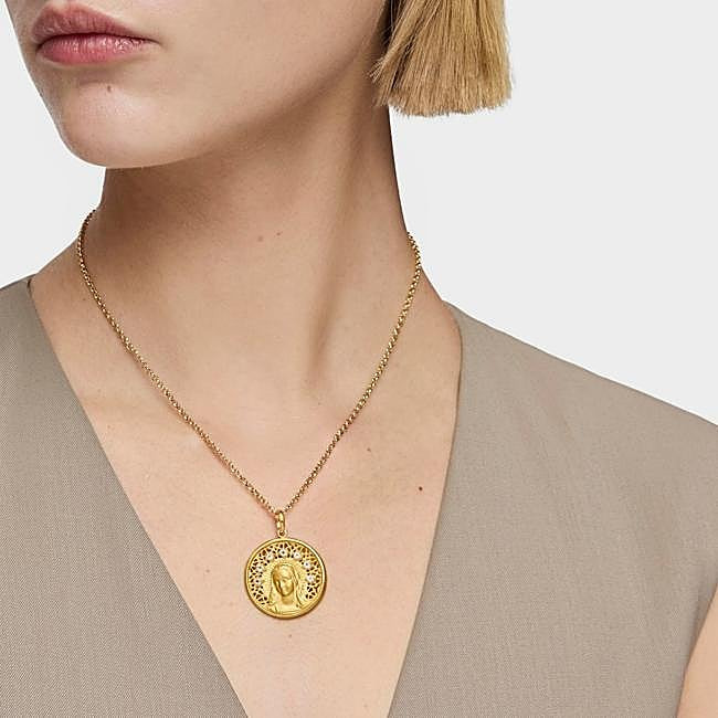 Textured Coin Pendant Necklace Over a Neutral Beige Top Textured Coin Pendant Necklace Over a Neutral Beige Top — Locket Necklaces 2027