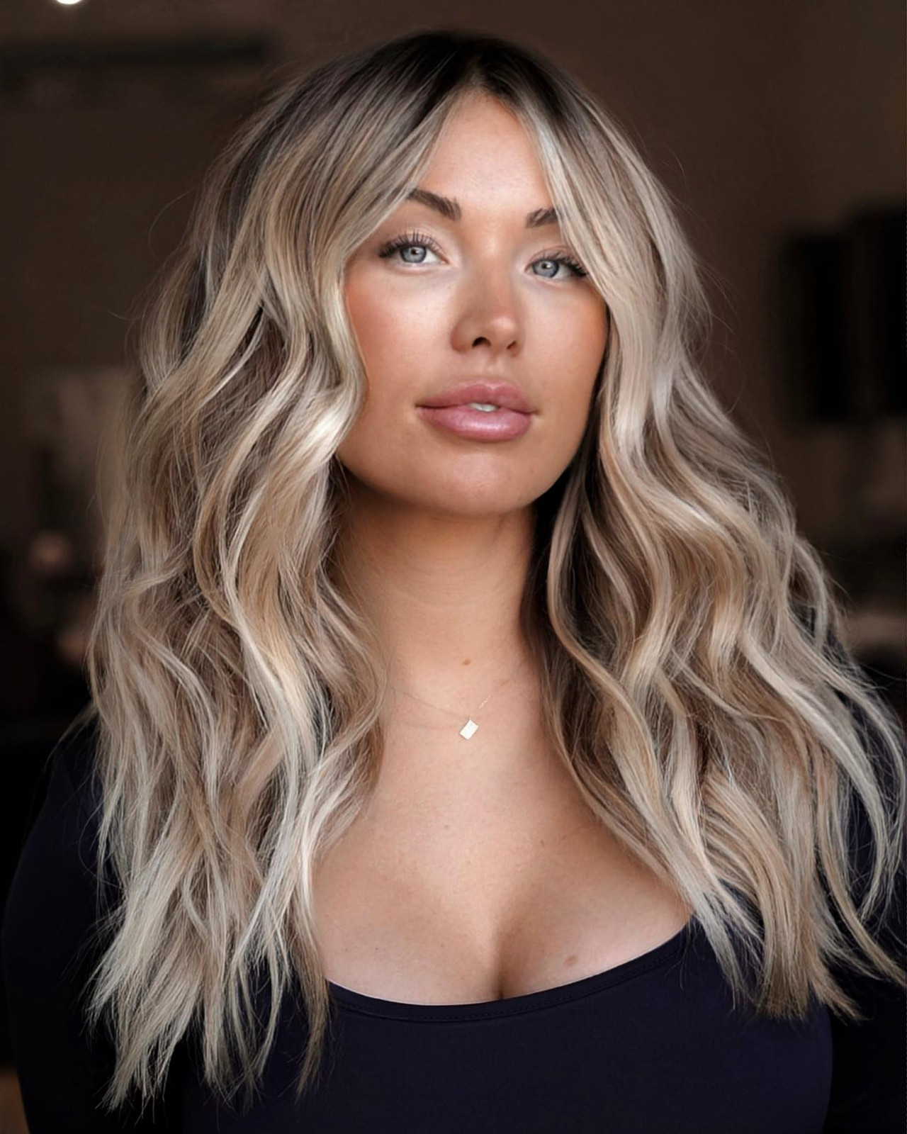 Cool Ash Blonde Waves With Curtain Bangs Cool Ash Blonde Waves With Curtain Bangs — Ash Blonde Hair 2027
