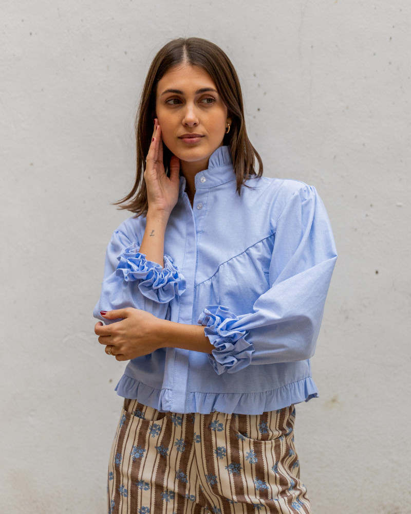 Ruffled Oxford Shirt with Striped Trousers Ruffled Oxford Shirt with Striped Trousers — Lisbon Outfits 2027