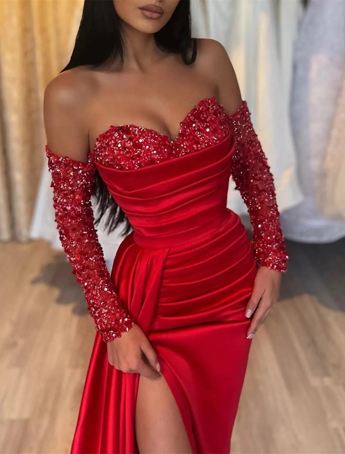 Glamorous Red Gown with Off-the-Shoulder Neckline and Sequined Sleeves Glamorous Red Gown with Off-the-Shoulder Neckline and Sequined Sleeves — Red Prom Dresses 2027