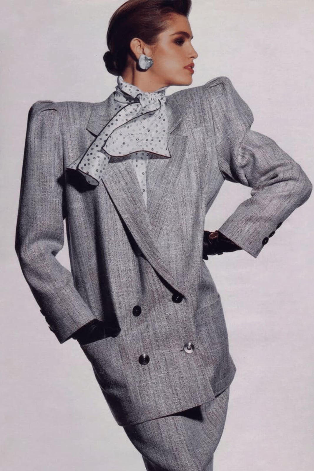 Gray textured blazer with extreme shoulder pads and scarf Gray textured blazer with extreme shoulder pads and scarf — 80s Luxury Outfits 2027