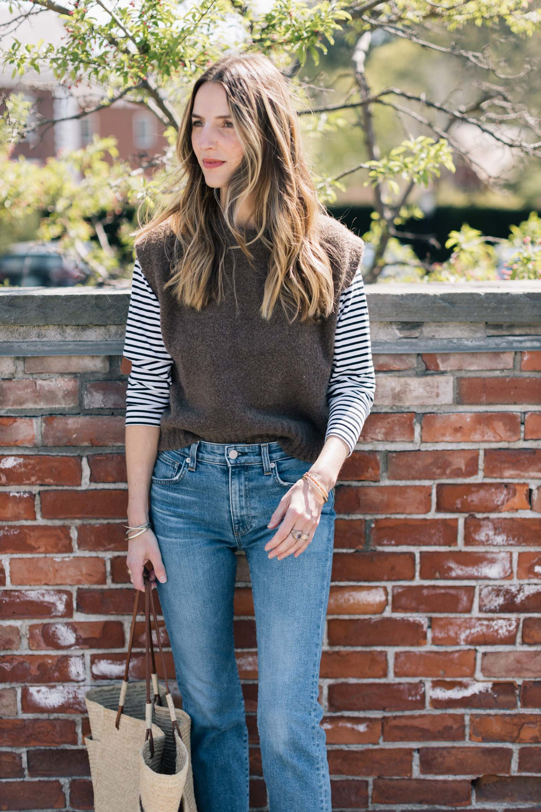 Brown Sweater Vest Over Striped Shirt with Light Blue Jeans Brown Sweater Vest Over Striped Shirt with Light Blue Jeans — Sweater and Jeans Outfits 2027