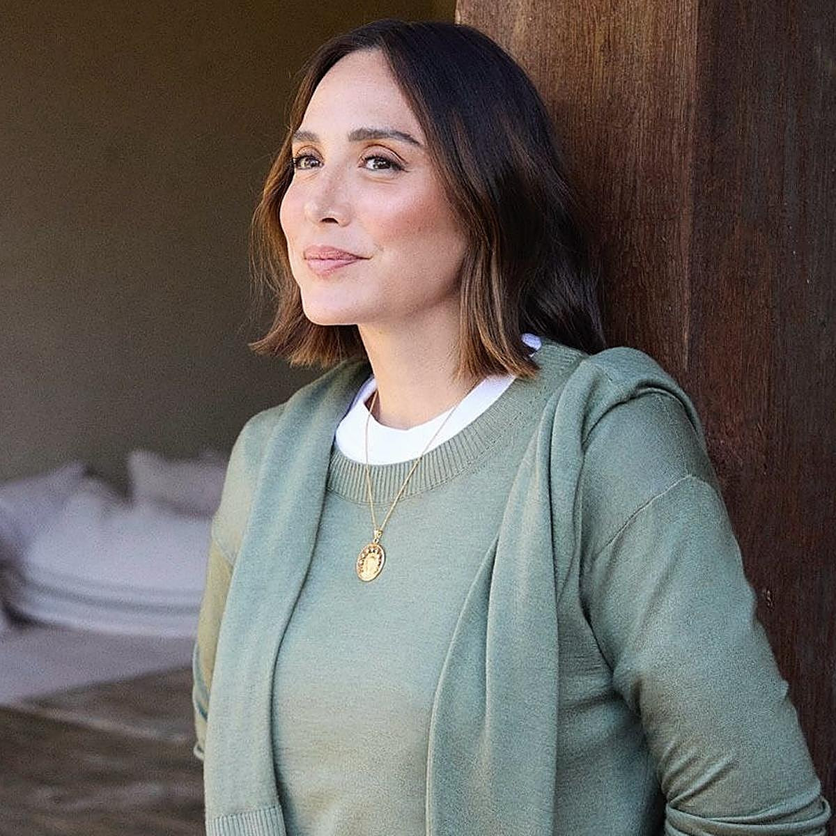 Layered Olive Green Knitwear Anchored by a Gold Medallion Layered Olive Green Knitwear Anchored by a Gold Medallion — Locket Necklaces 2027