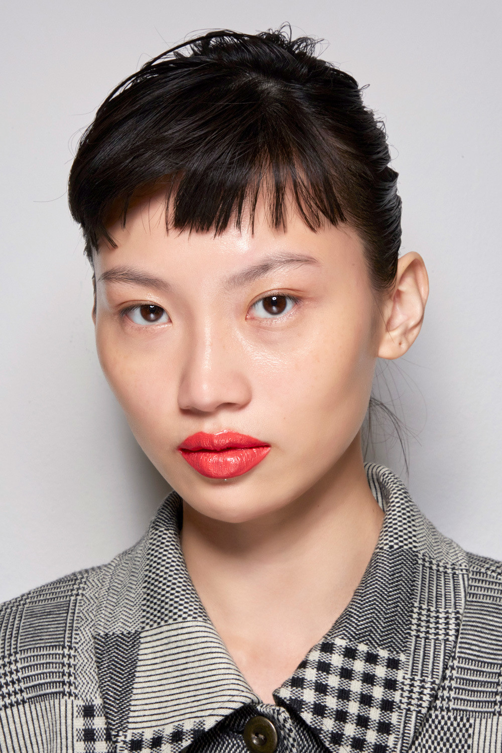 Chin Length Black Bob With Slicked Back Baby Bangs Chin Length Black Bob With Slicked Back Baby Bangs — Baby Bangs 2027