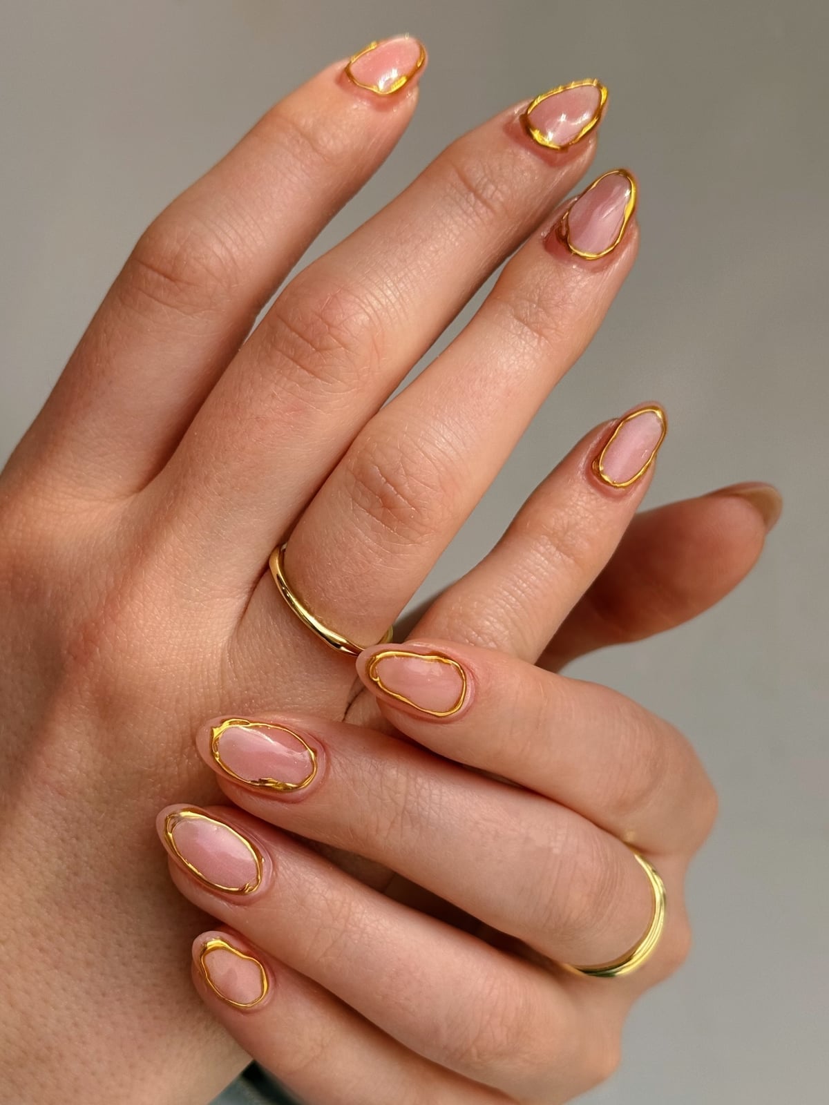 Shimmery Nude Almond Nails with Gold Tip Outline Shimmery Nude Almond Nails with Gold Tip Outline — Almond Nails 2027 for Short Nail Beds