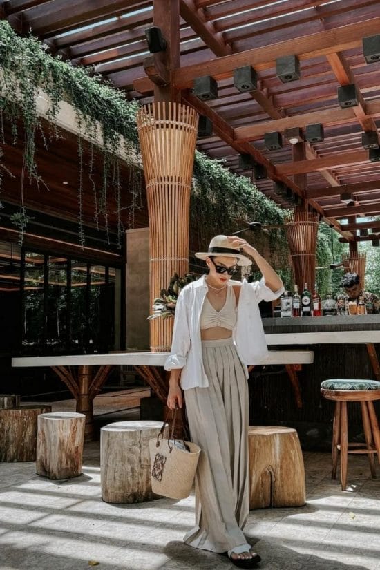 Linen shirt layered over bralette with wide-leg pants Linen shirt layered over bralette with wide-leg pants — Bali Outfits 2027