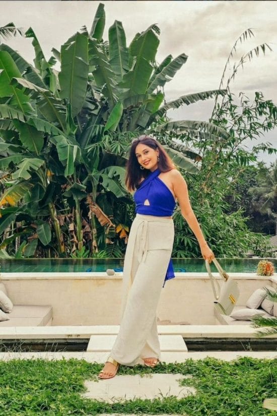 Royal blue halter top with cream pants Royal blue halter top with cream pants — Bali Outfits 2027