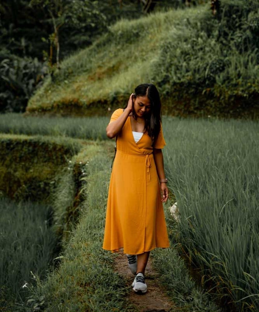 Orange wrap dress over tank top for exploration Orange wrap dress over tank top for exploration — Bali Outfits 2027