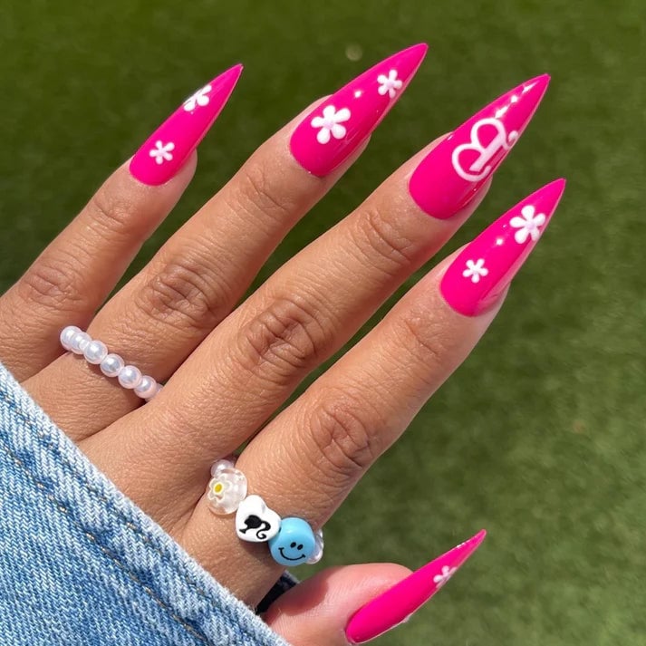 Long Stiletto Hot Pink Barbie Logo Flowers Long Stiletto Hot Pink Barbie Logo Flowers — Barbie Pink Nails 2027