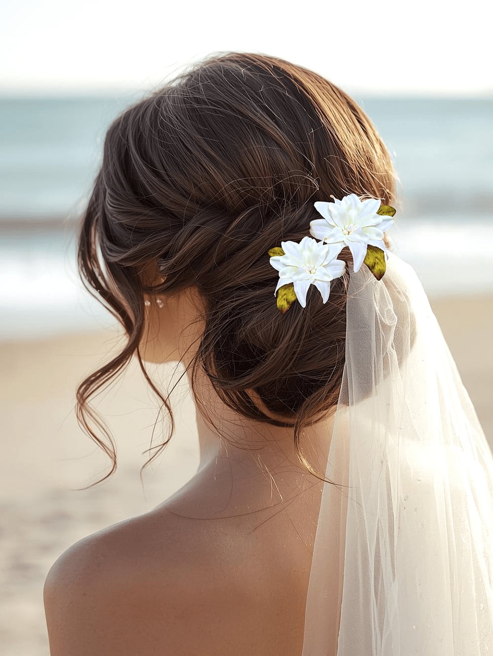 Dark Brown Wavy Updo With Floral Accents Dark Brown Wavy Updo With Floral Accents — Beach Wedding Hairstyles 2027