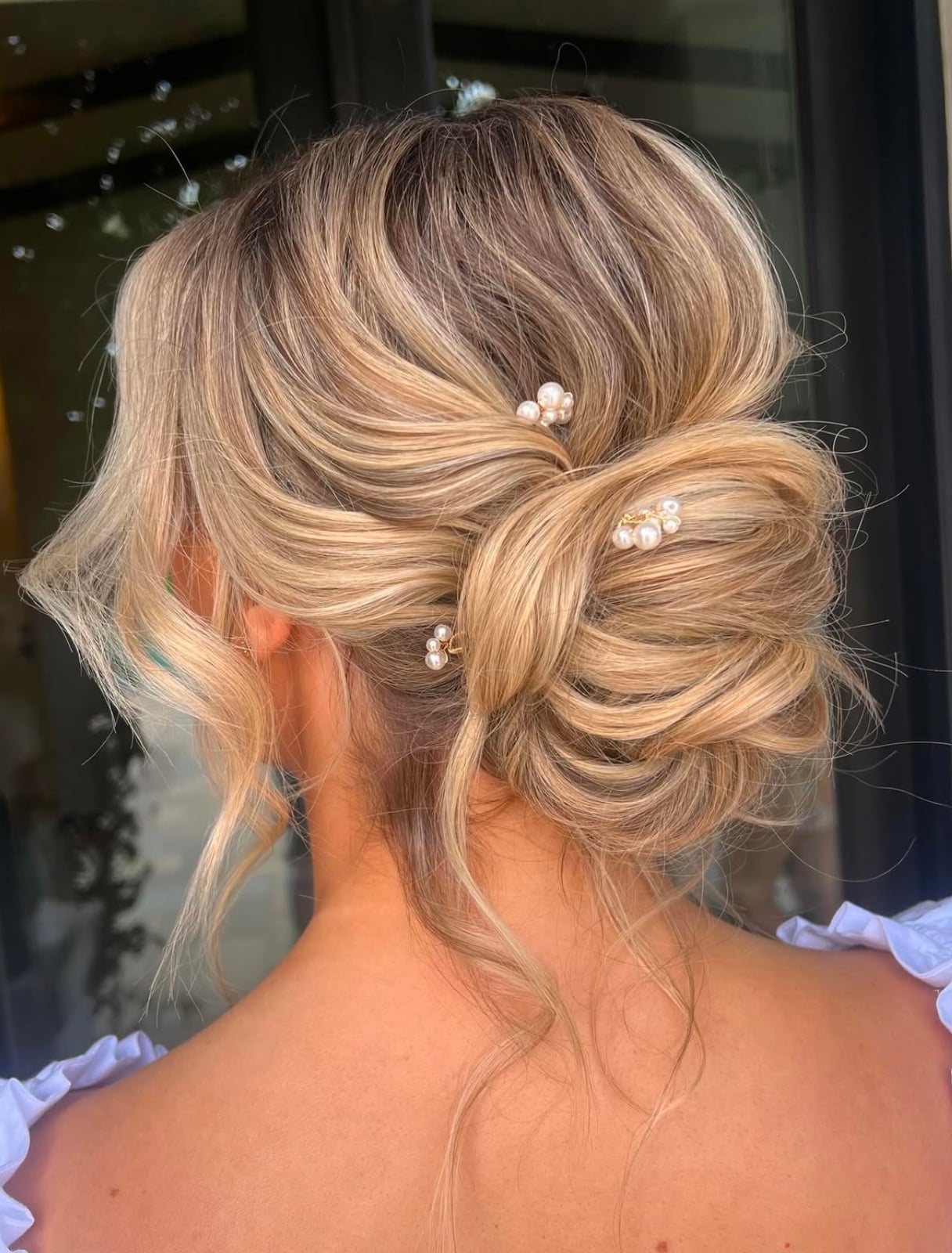 Textured Low Bun With Pearl and Crystal Pins Textured Low Bun With Pearl and Crystal Pins — Beach Wedding Hairstyles 2027