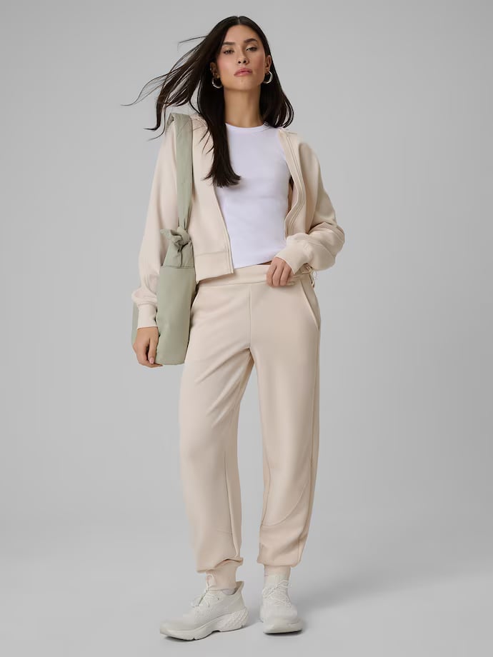 Beige Tracksuit With White Tee And Green Tote Bag, Close-Up Take Beige Tracksuit With White Tee And Green Tote Bag, Close-Up Take — Beige Joggers Outfits 2027