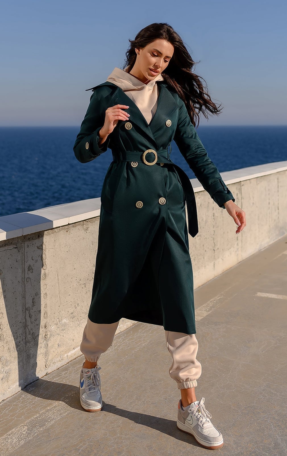 Dark Green Trench With Hoodie And Sneakers, Smooth Fabric Dark Green Trench With Hoodie And Sneakers, Smooth Fabric — Belted Trench Coat Outfits 2027