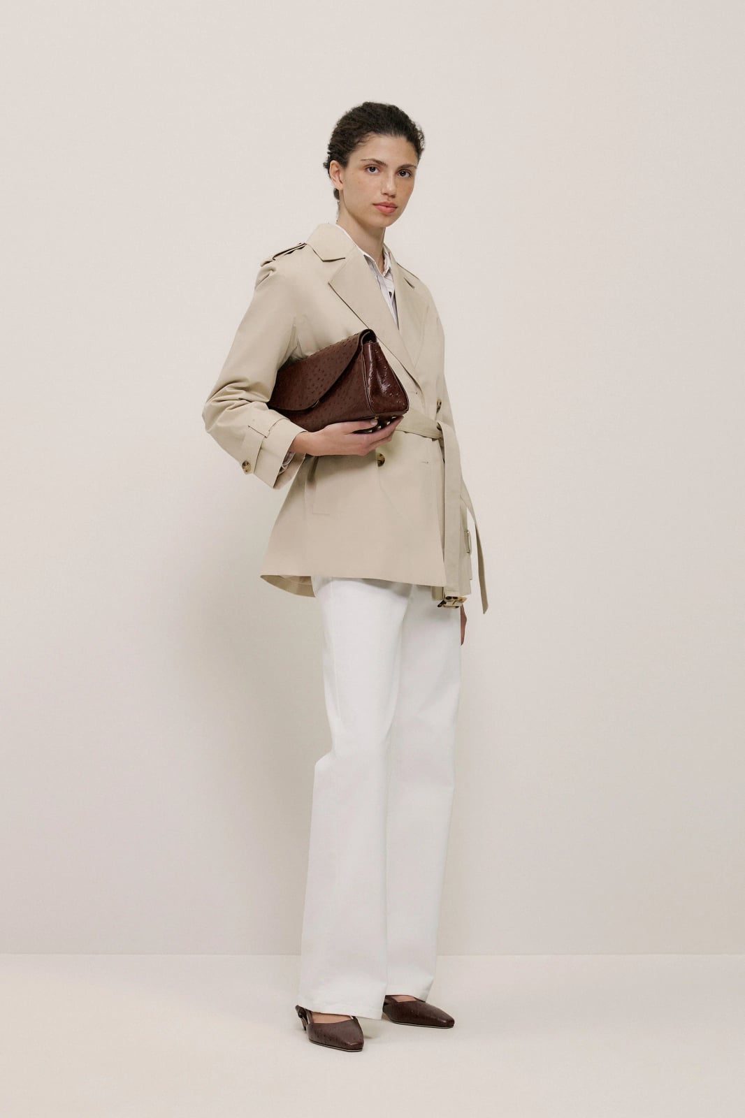 Beige Trench With White Trousers And Leather Clutch Beige Trench With White Trousers And Leather Clutch — Belted Trench Coat Outfits 2027