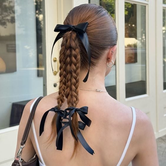 Mid-Back Two Braids With Black Ribbon Bows Mid-Back Two Braids With Black Ribbon Bows — Big Hair Bow Hairstyles 2027