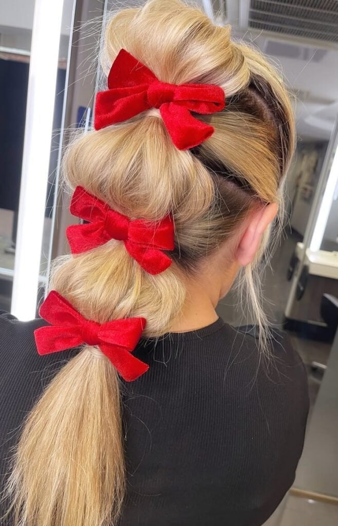 Blonde Braided Ponytail With Red Velvet Bows Blonde Braided Ponytail With Red Velvet Bows — Big Hair Bow Hairstyles 2027
