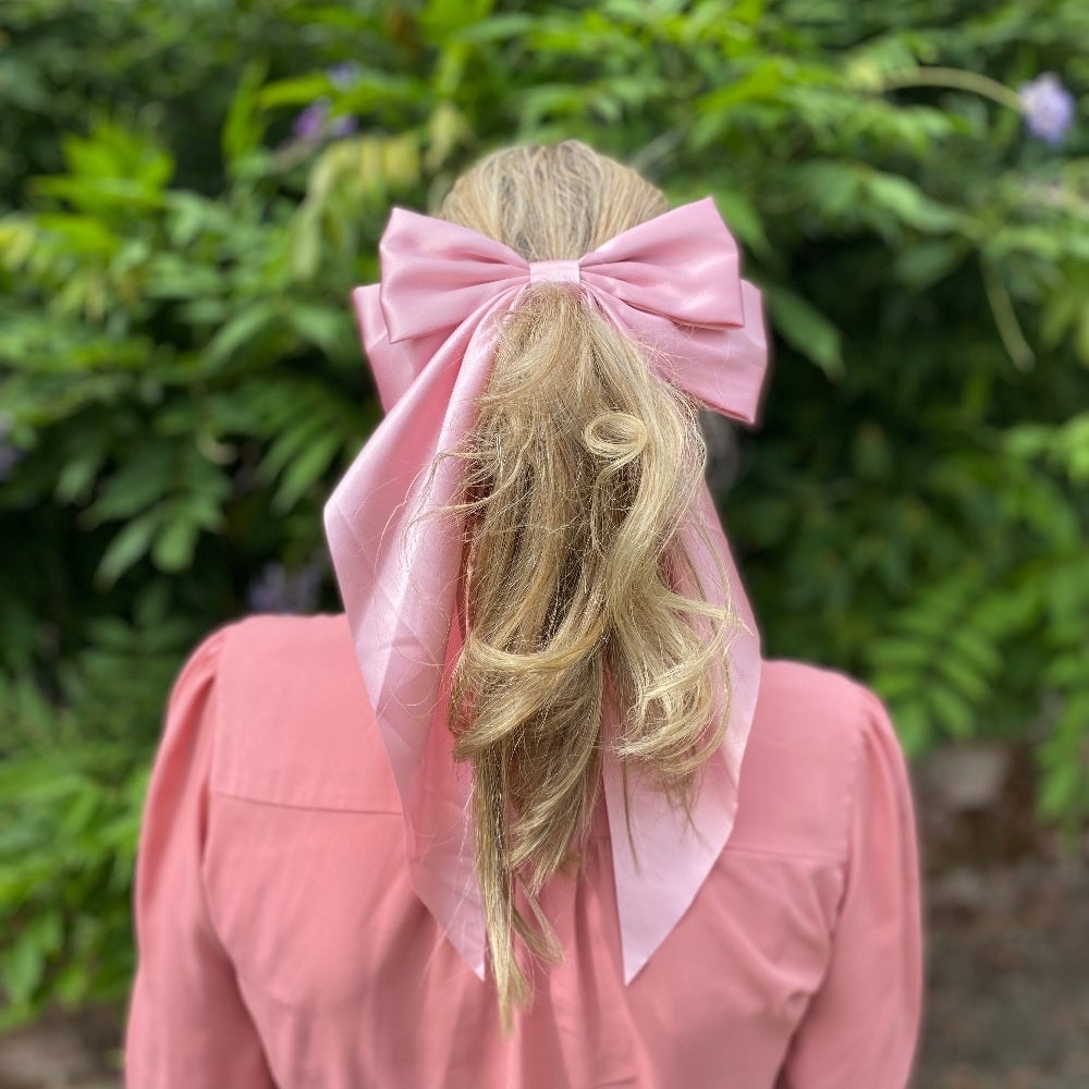Mid-Back Ponytail With Large Pink Bow Mid-Back Ponytail With Large Pink Bow — Big Hair Bow Hairstyles 2027
