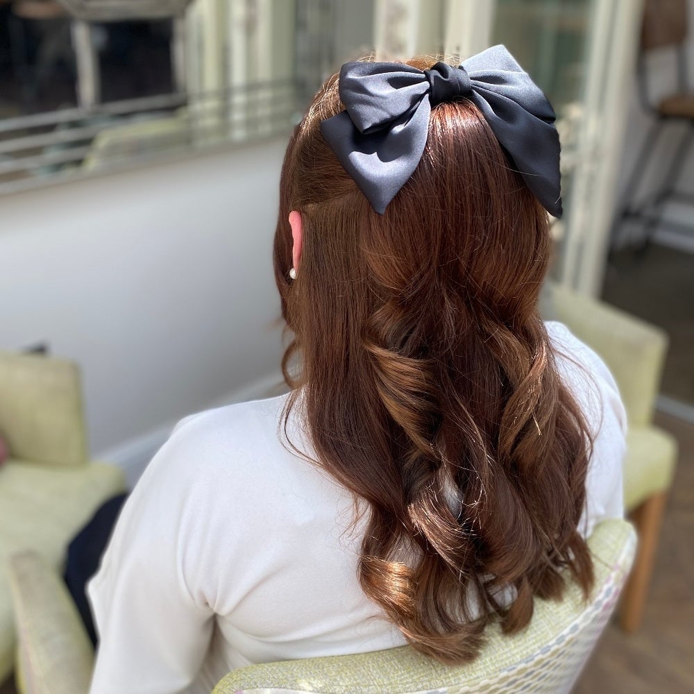 Mid-Back Half Up Half Down With Curls and Oversized Bow Mid-Back Half Up Half Down With Curls and Oversized Bow — Big Hair Bow Hairstyles 2027